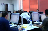 image of teachers marking on computers