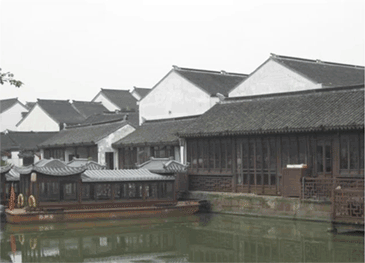 Scene depicting Chinese temple by a river
