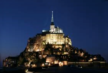 castle on a cliff at night