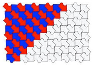 A rectangle filled with broad arrows that fit together forming a tessellating (tiling) pattern. Half of the rectangle has arrows placed together in outline and the other half of the rectangle continues the pattern made by the arrows but those arrows pointing downwards (diagonally) are coloured red and those pointing upwards (diagonally) are coloured blue.